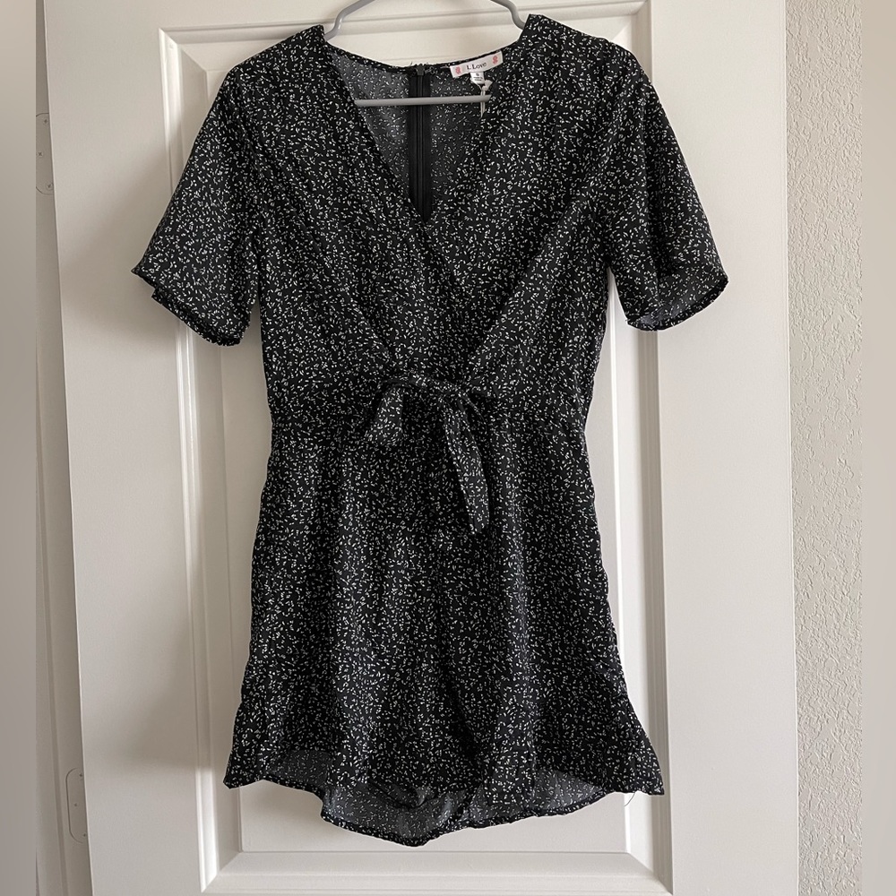 Black w/ white floral romper. L Love. S,M,L. Never worn